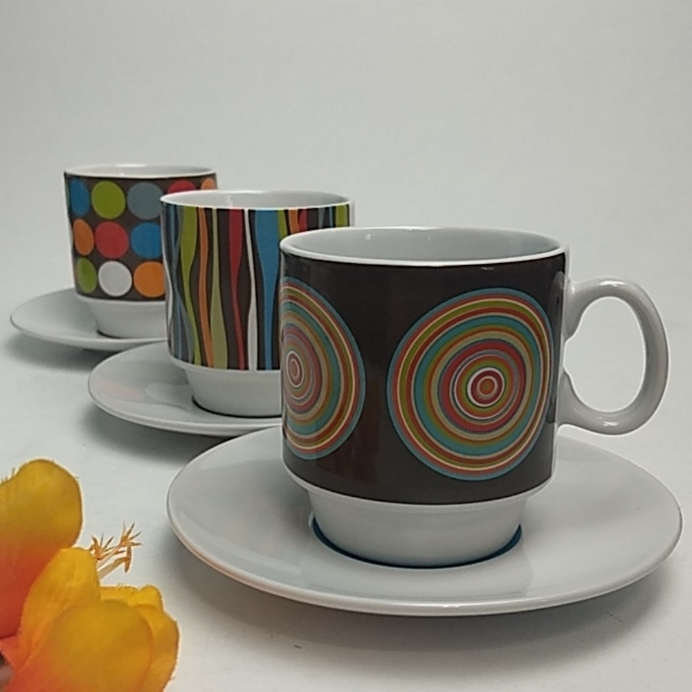 Caribou Coffee stackable cups and saucers set
